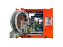Offshore water jetting pump unit with integral hose reel.