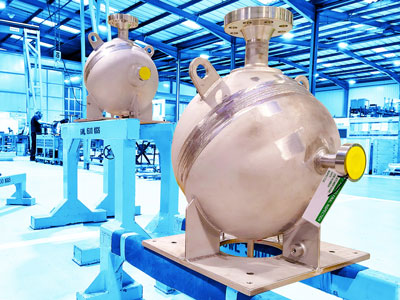 A spherical resonator for an offshore, high pressure pump package.